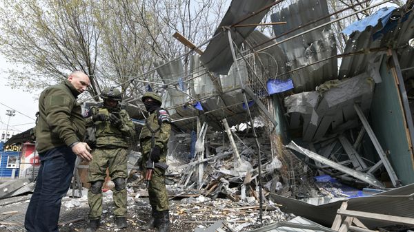 Последствия обстрела рынка в Донецке