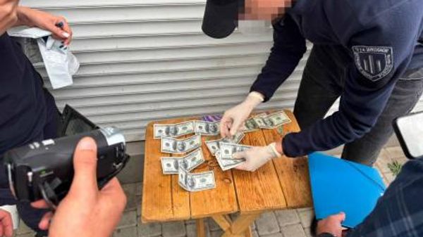 Украинский пограничник попался на поборах с торговцев рынков Одессы