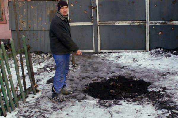 Последствия обстрелов Донецка Последствия обстрелов Донецка
