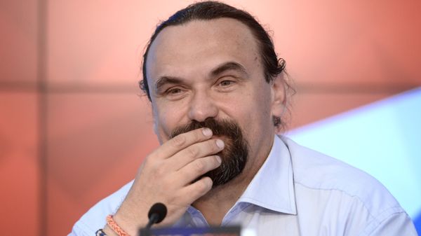 Журналист МИА Россия сегодня Александр Чаленко во время презентации сборника Олесь Бузина. Пророк и мученик в Международном мультимедийном пресс-центре МИА Россия сегодня