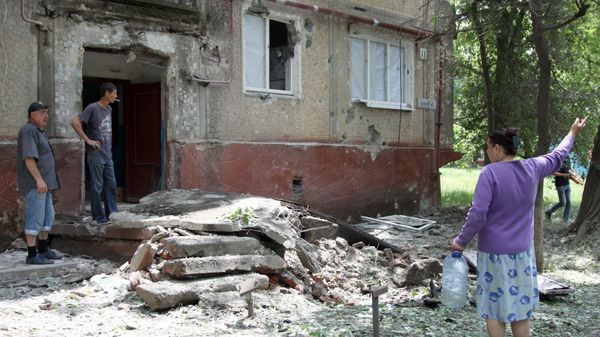 Последствия обстрелов населенных пунктов в Донбассе украинскими силовиками